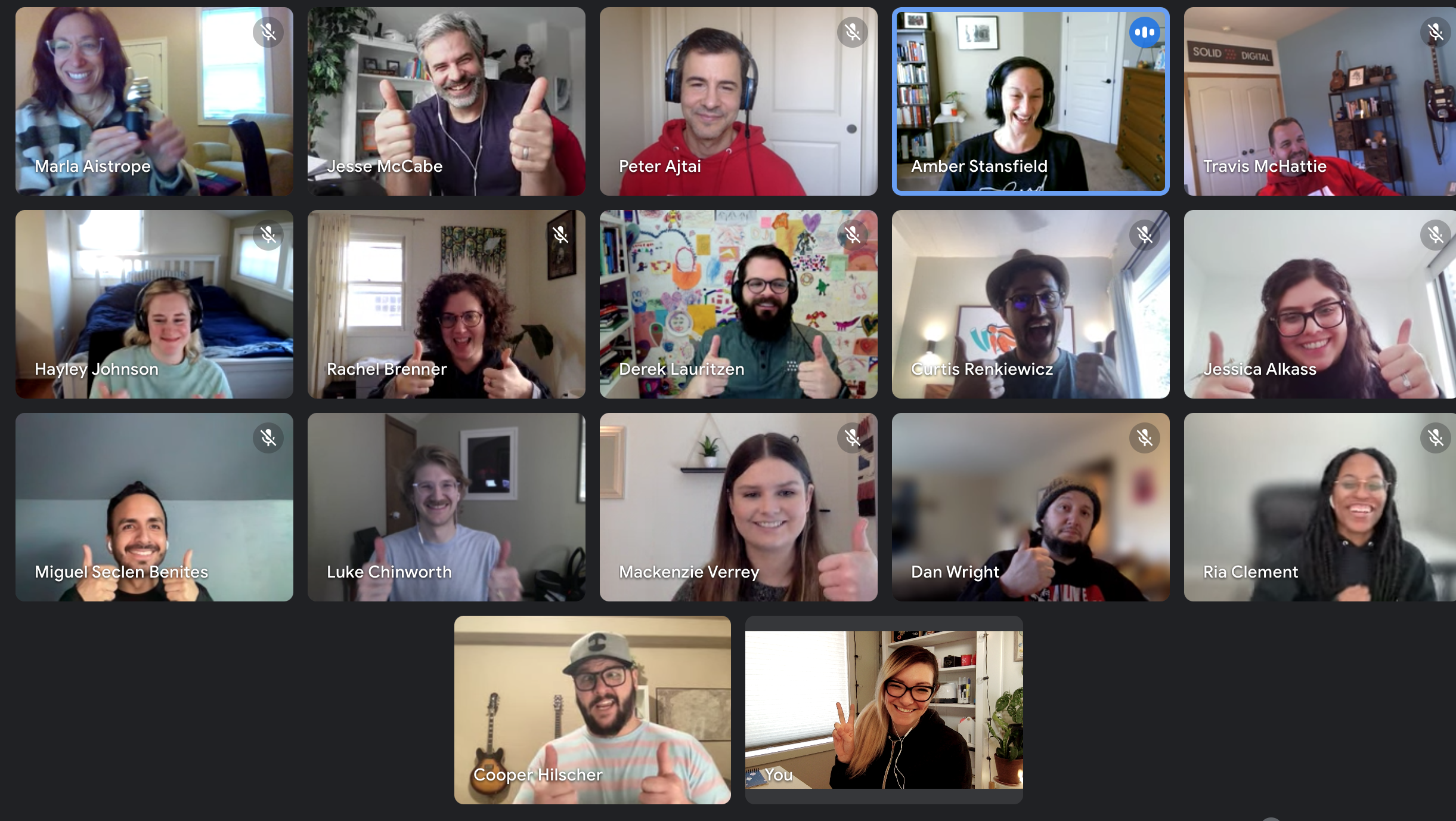 A Screen capture of a Zoom Call where the Solid Digital team is posing for a photo