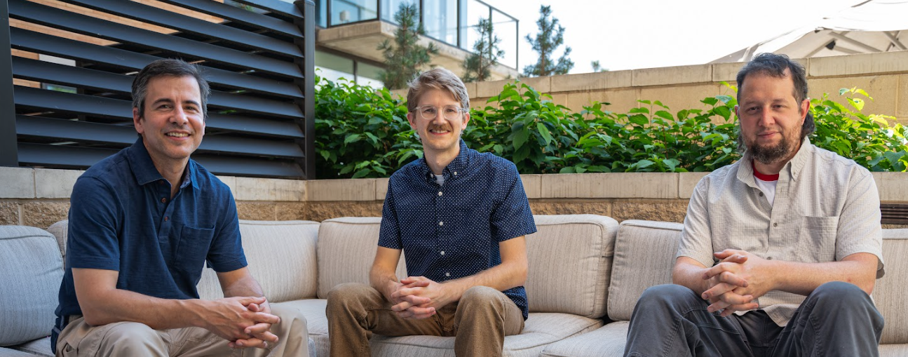 Picture of Solid Digital's Director of Technology, Peter Ajtai, sitting next to Senior Web Developer Luke Chinworth and Web Developer Dan Wright.