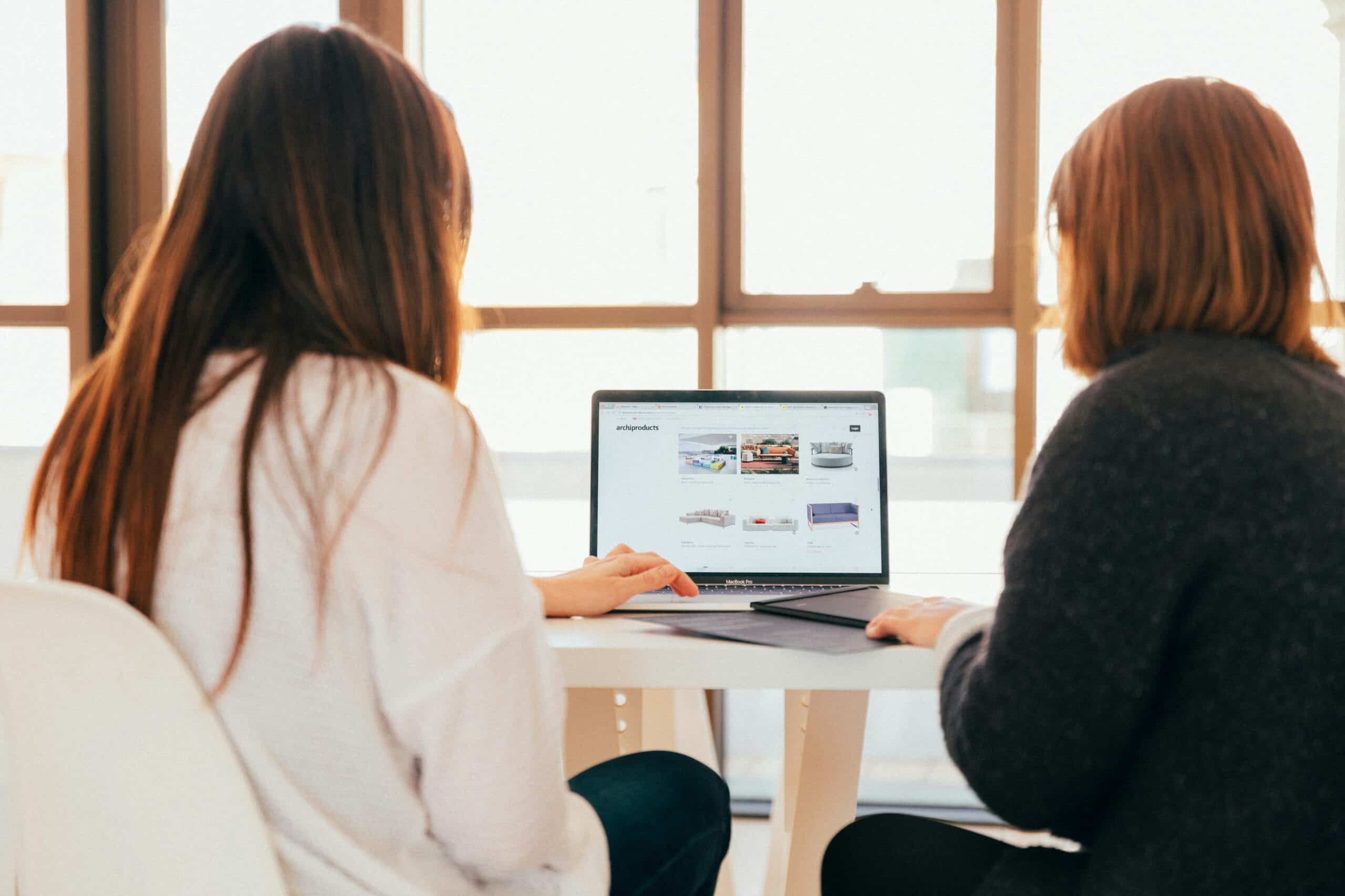 Two women optimizing website images